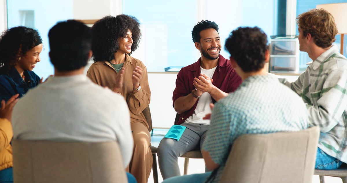 Support group meeting with diverse people